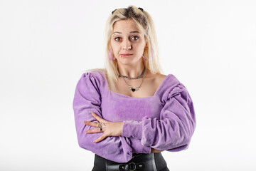 Cute millennial woman wearing blouse standing isolated over white background looking to the camera and imagine yummy food. Bites lips and wants it.