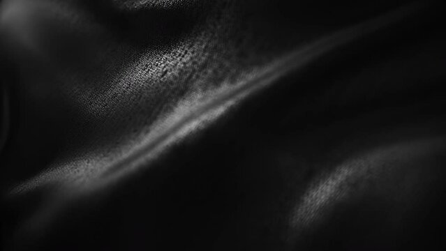 Waving luxury black cloth texture. Abstract background. Good for text or logo placement.