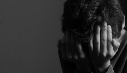 little boy praying to God with hands together stock photo