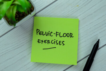 Concept of Pelvic-Floor Exercise write on sticky notes isolated on Wooden Table.