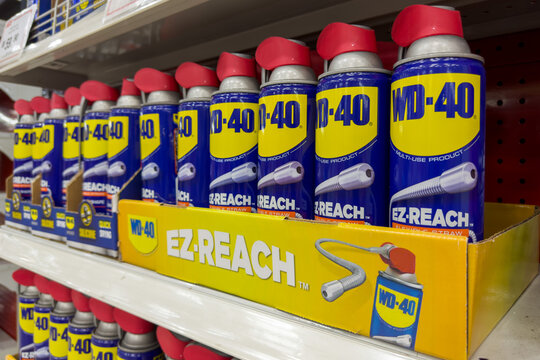 PENANG, MALAYSIA - OCT 04, 2022: WD 40 EZ-Reach multipurpose lubricant oil on the shelves of hardware store.