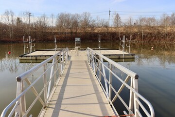 A front view of the metal dock at the lake.