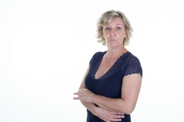 blond surprised expression mature woman folded arms crossed middle aged on white background