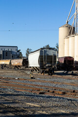 Fototapeta na wymiar Old abandoned train yard train tracks industrial
