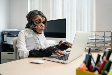 Monkey Business Woman typing on computer