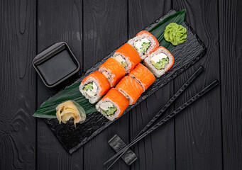 Classic Philadelphia sushi roll set with salmon and cream cheese.