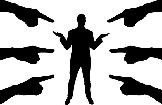 Silhouette of the hands shows fingers on a puzzled man. Concept of accusation, bullying