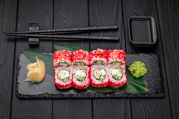 California sushi roll with crab, avocado, cucumber and tobiko caviar served
