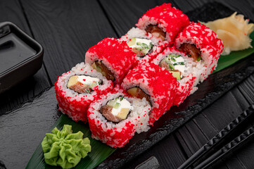 California sushi roll with crab, avocado, cucumber and tobiko caviar served