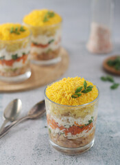 Mimosa salad in transparent glass