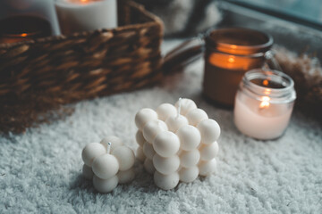Fototapeta na wymiar Soy handmade candles. Two natural white bubble candles. Decor