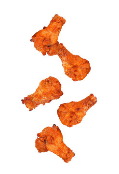 Barbecue chicken wings falling in the air isolated on transparent background. PNG