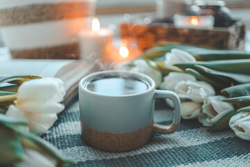 Cup of tea, tulips and book, good morning