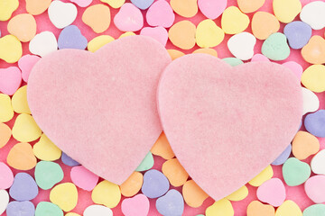 Blank two felt hearts with lots of candy hearts