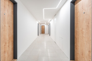 corridor with entrances to the apartment in the apartment building