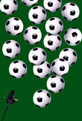 footballs and whistle on a green background