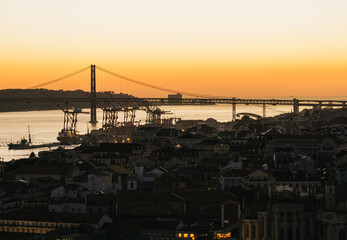 sunset view of lisbon bridge