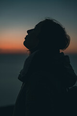silhouette of a girl at sunset