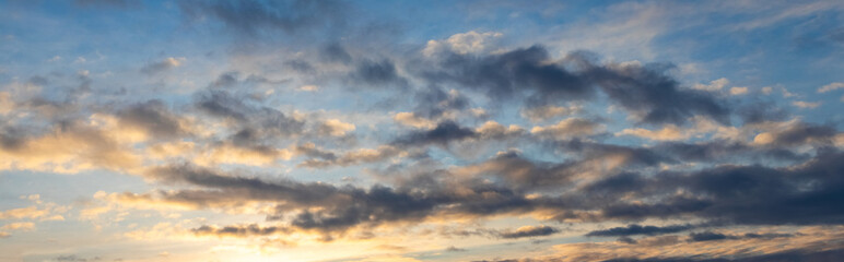 Dark clouds in the blue sky during sunset