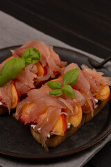 Toast with prosciutto and peach