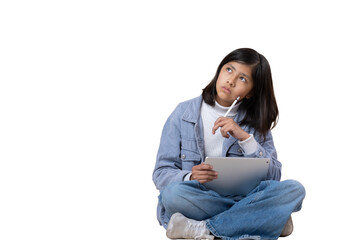 Mexican girl sitting on the floor thinking expression with tablet and stylus pen