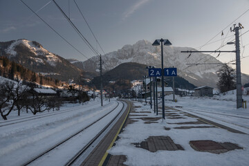 Winter evening in Spital am Pyhrn in Austria with railway station
