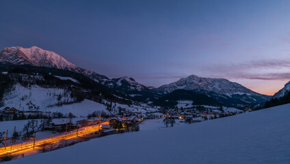 Winter evening over Spital am Pyhrn in Austria with railway station