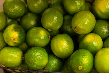 ripe limes, natural fruit background, healthy food, vitamins