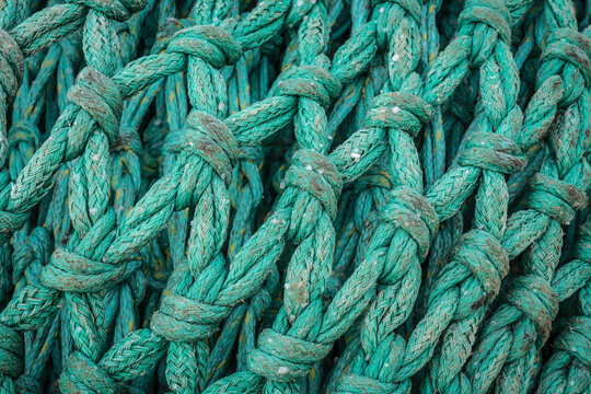 detail of a weathered trawler fishing net