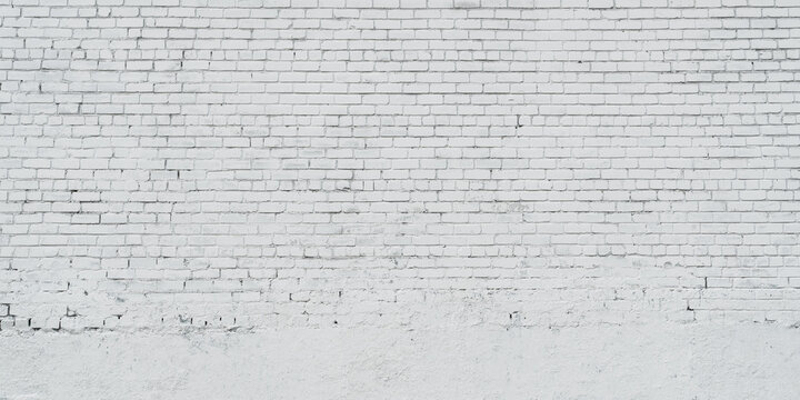Fototapeta Empty big white brick wall with copy space outdoor. Abstract background of white brickwall.