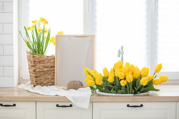 Kitchen interior with a fresh bouquet of tulips.