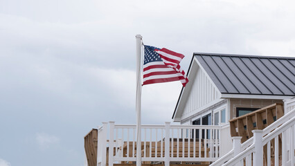 Fototapeta premium American flag on beach, horizon