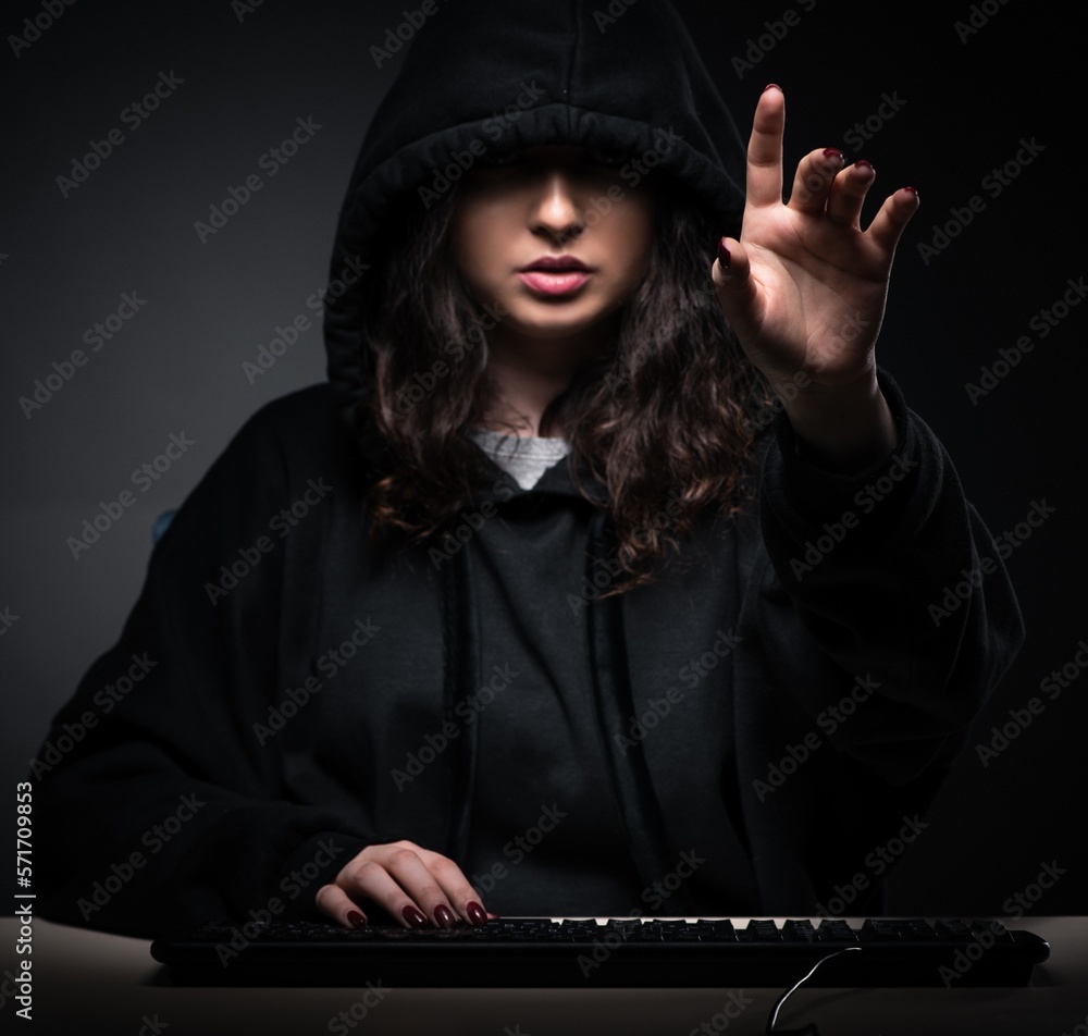 Poster female hacker hacking security firewall late in office
