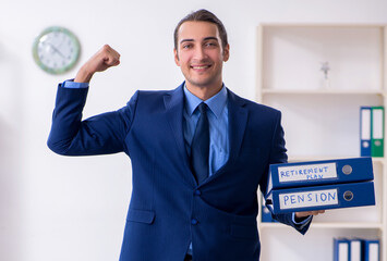 Young male accountant working in the office