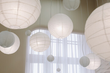 Beige paper lamps in modern interior. cozy home interior