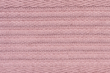 Fototapeta na wymiar Texture of pink cotton towel, canvas. Macro