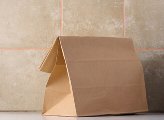 Full brown paper bag, takeaway food packaging