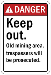 Active mine site warning sign and labels keep out, old mining area. Trespasser will be prosecuted