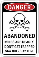 Mine site warning sign and labels abandoned mine are deadly. Don't get trapped, stay out stay alive