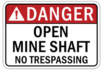 Fototapeta premium Active mine site warning sign and labels open shaft no trespassing