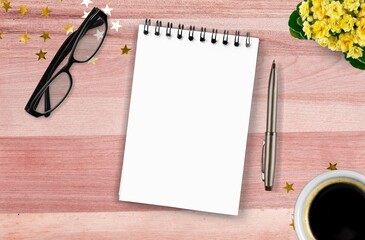 Blank note with stationery items on the desk