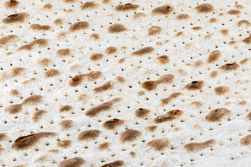 Matzah. Jewish traditional Passover bread. Pesach celebration symbol. Close-up.