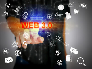 A man's hand activates powerful Web 3.0 technology for many digital activities such as virtual reality, chatbots, cryptocurrency, cloud computing, and communication.