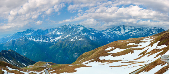 Summer (June) Alps mountain and winding road (view from Grossglockner High Alpine Road).  - obrazy, fototapety, plakaty