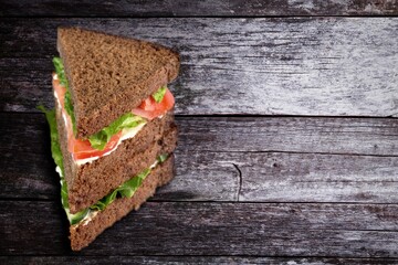 Tasty fresh sandwich with cheese and vegetables