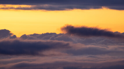 Aerial Cloudscape during morning Sunrise Sky. British Columbia, Canada. Nature Background