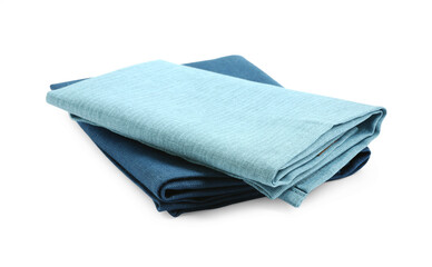 Folded fabric napkins for table setting isolated on white