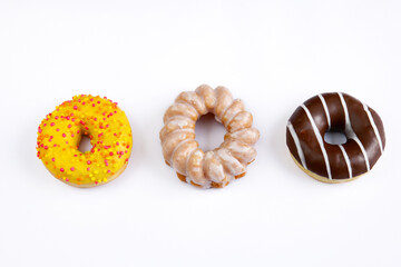 Treats for Fat Thursday - donuts on a white background