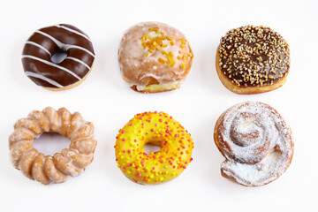 Treats for Fat Thursday - donuts on a white background