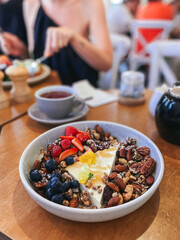Fancy breakfast panna cotta with nutty granola at a Perth cafe for brunch.